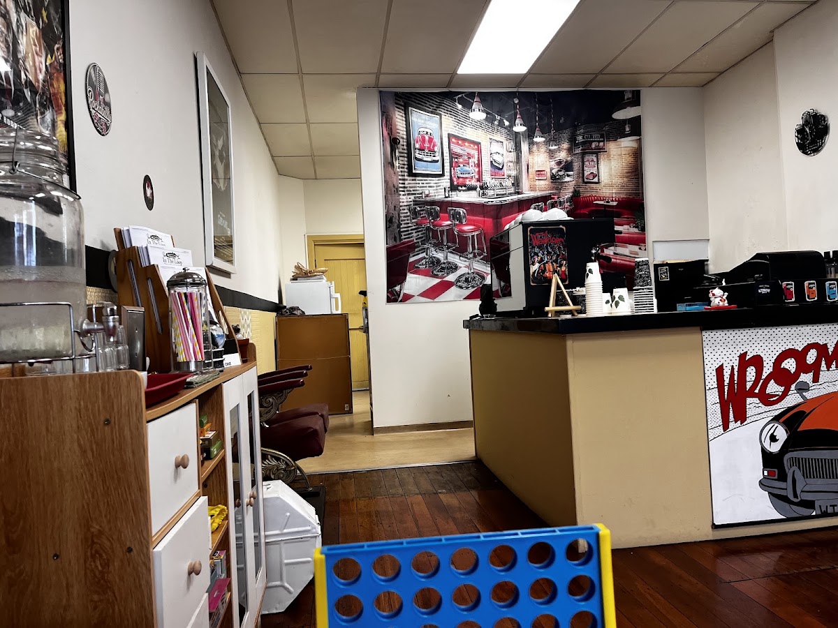 Interior with retro diner mural and comic art counter