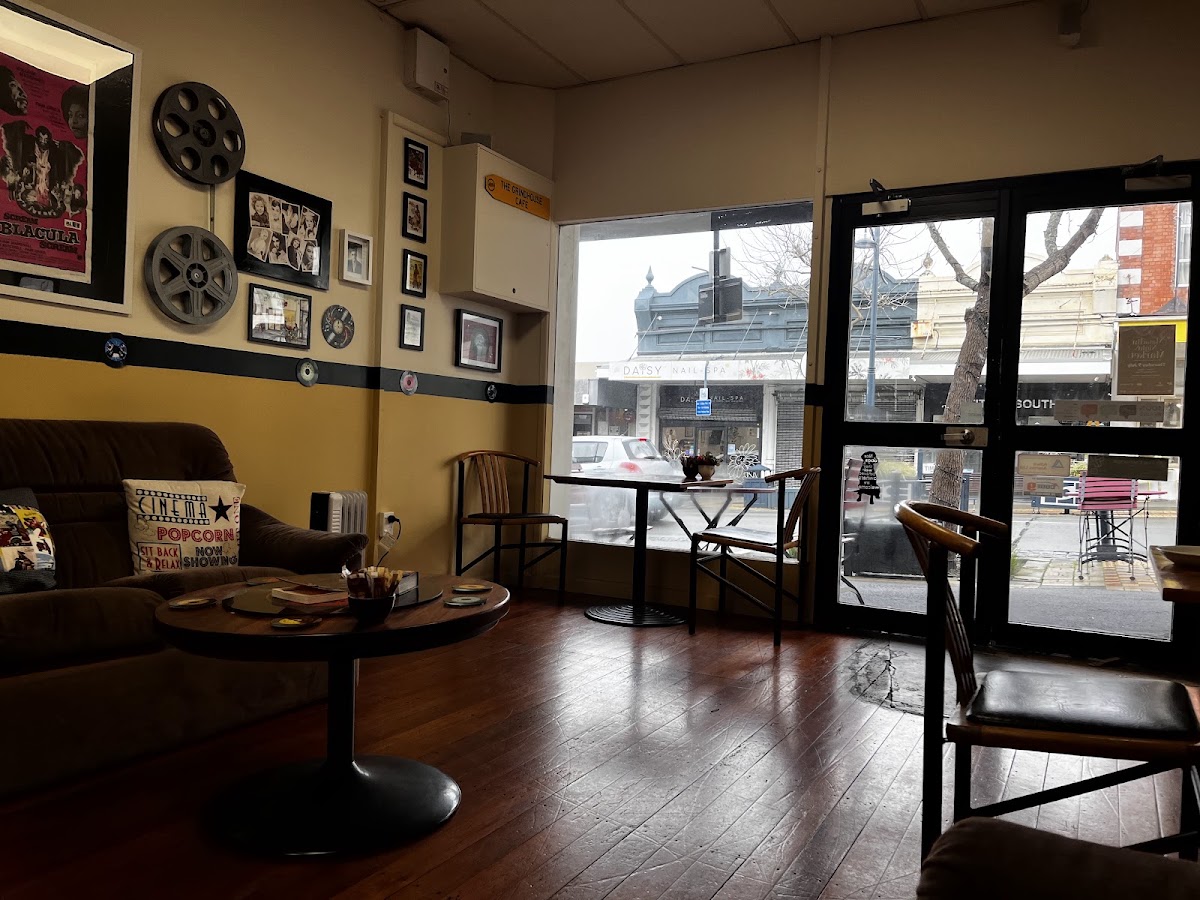 Corner with Blacula poster, film reels and cinema cushions